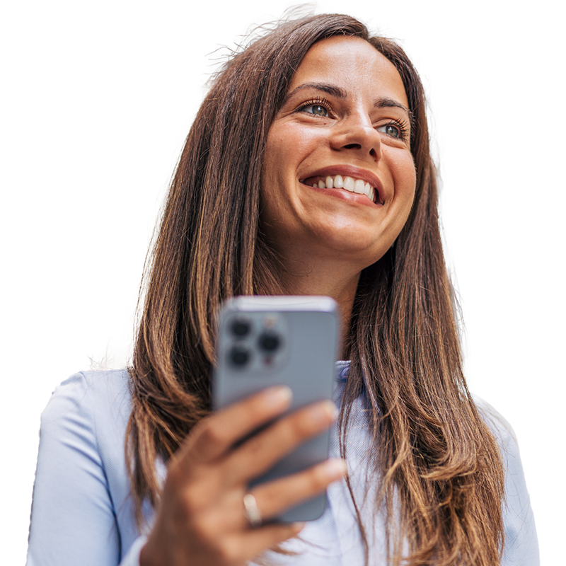 Woman smiling and holding phone