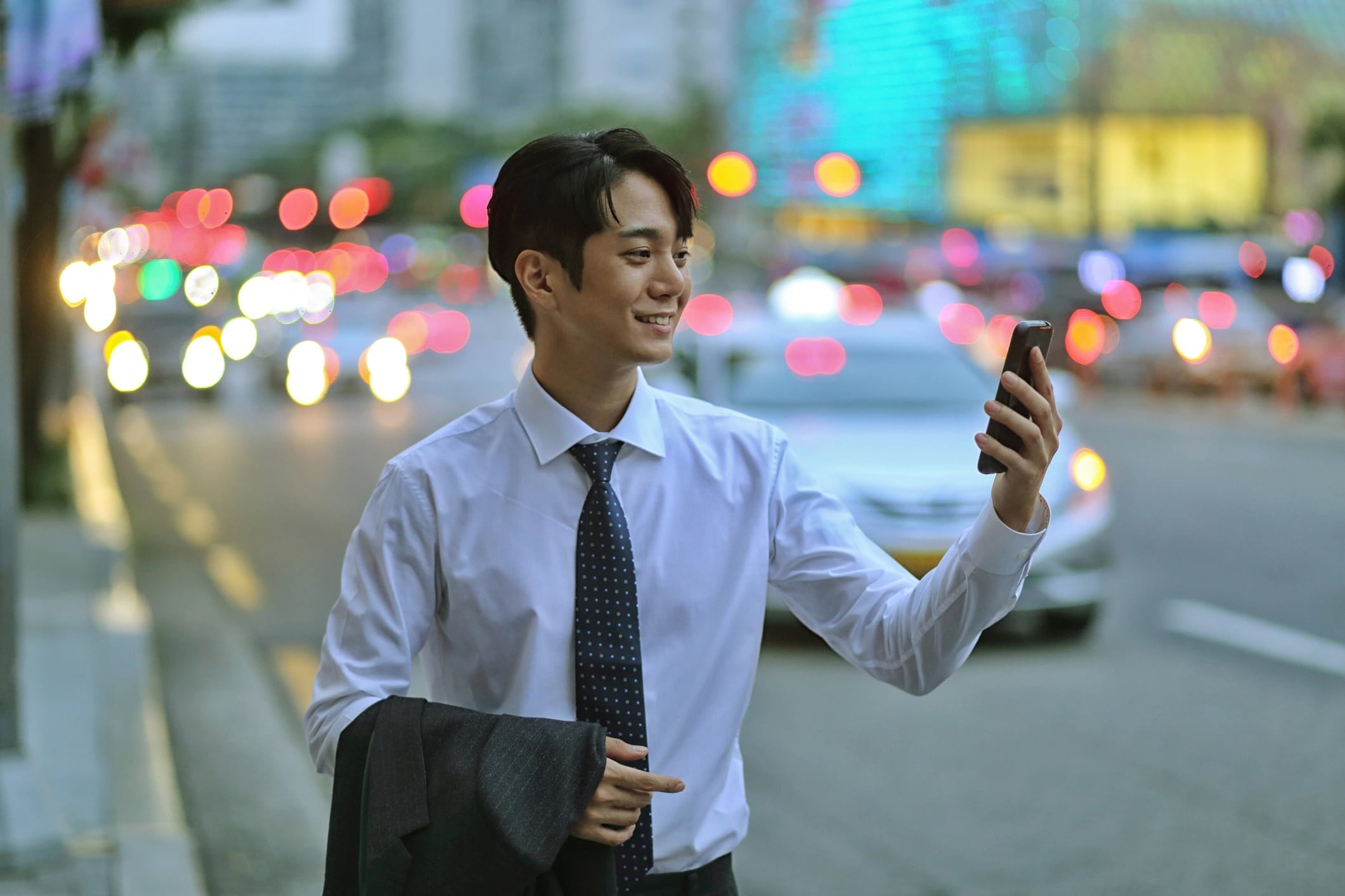 Man on street in business attire