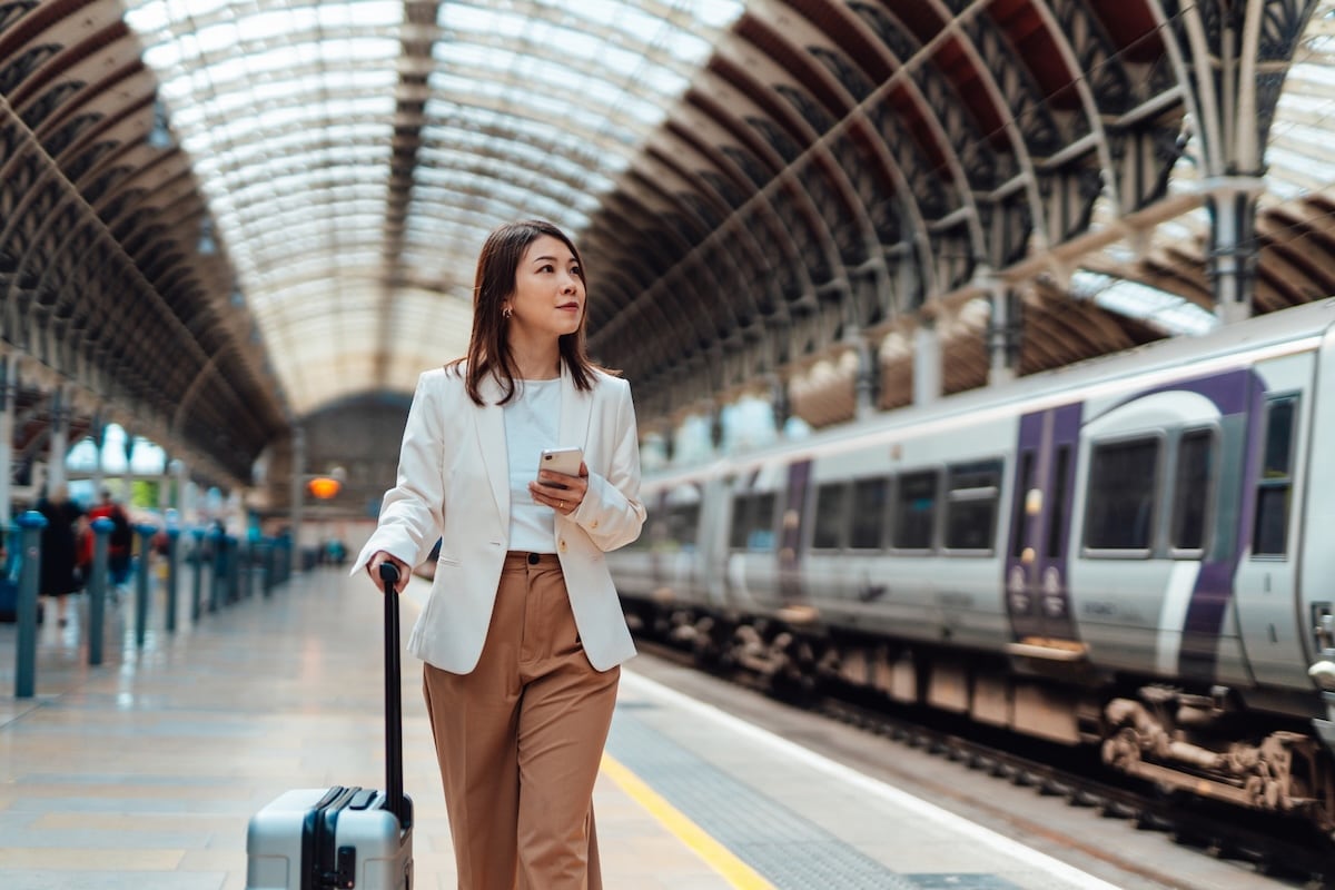 Business traveller at a train station