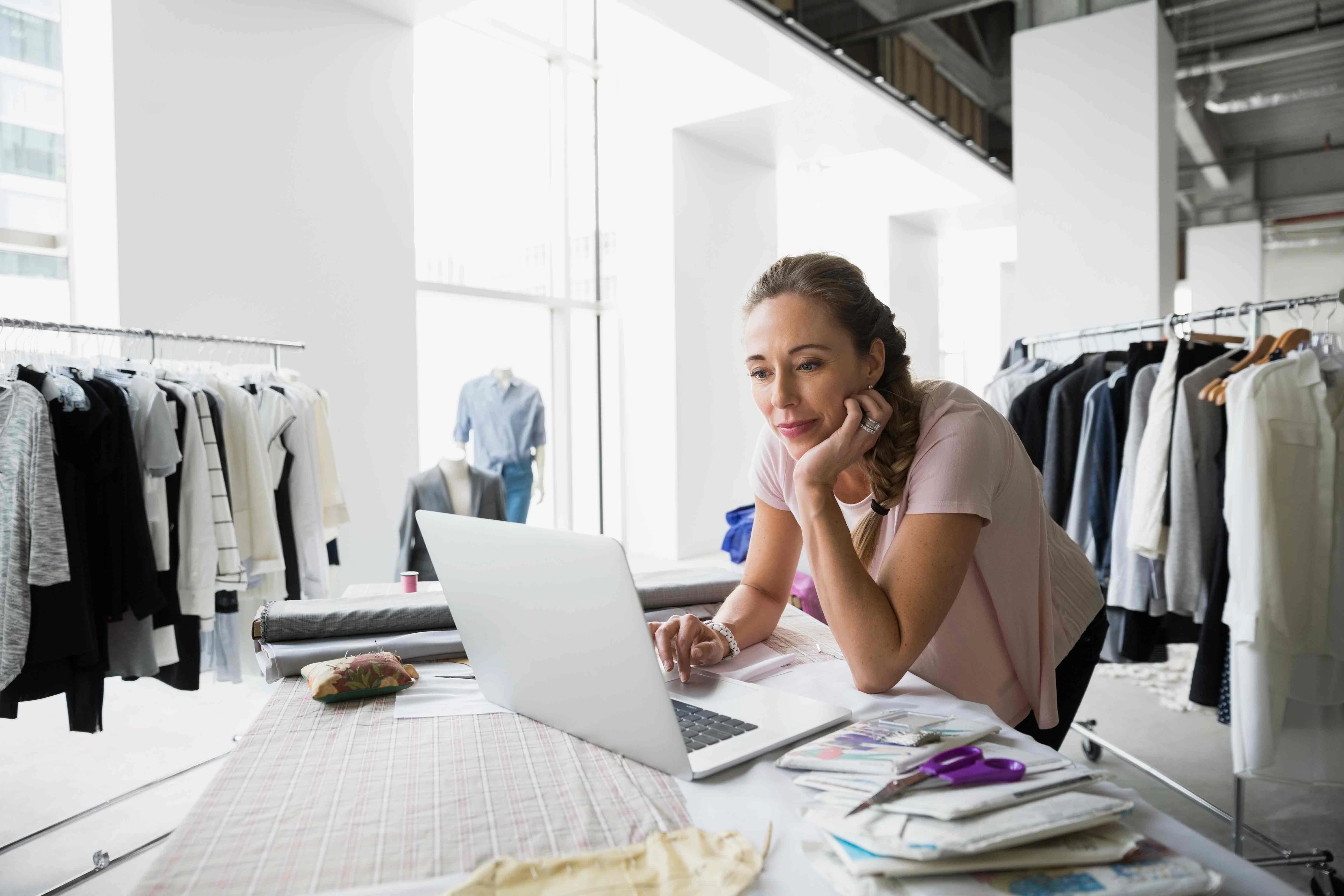 woman looking at laptop