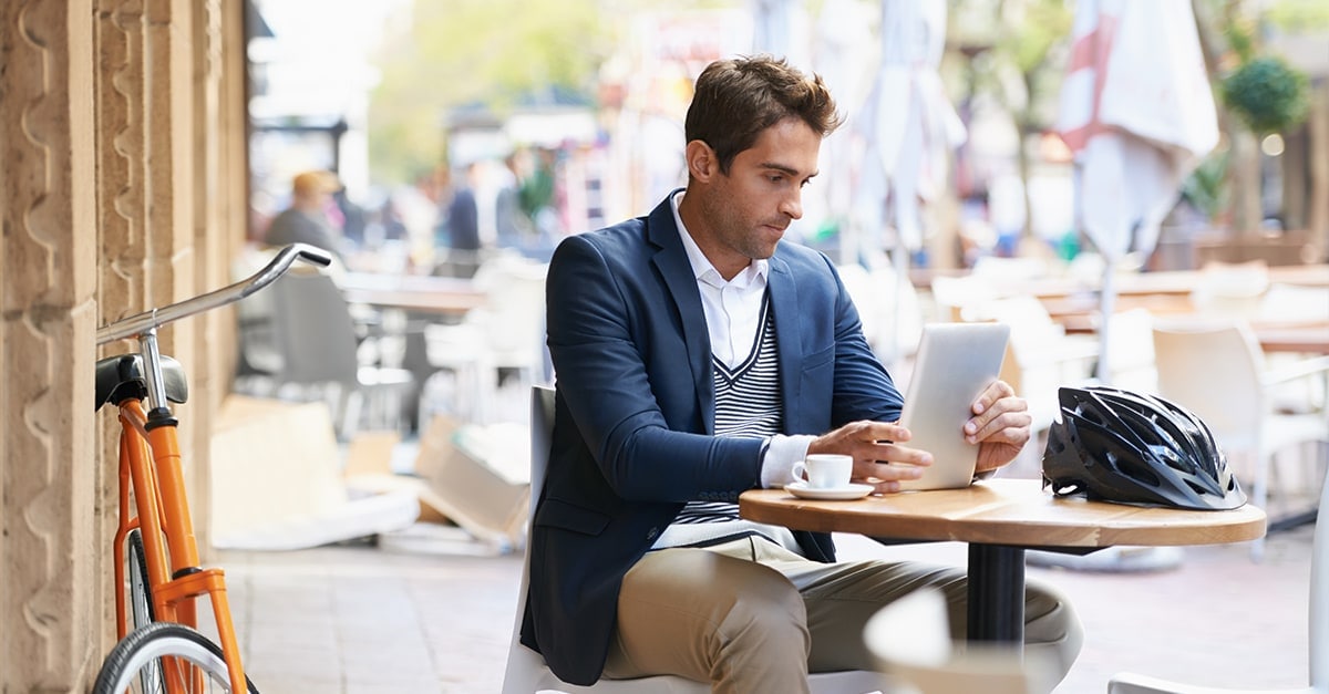 Man sitting at outdoor table