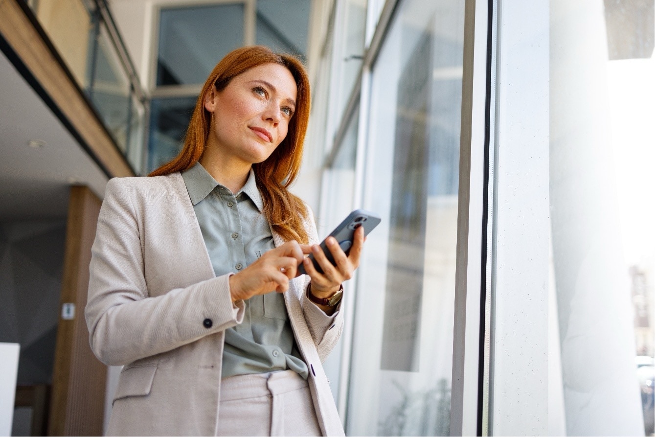 Woman on phone in office