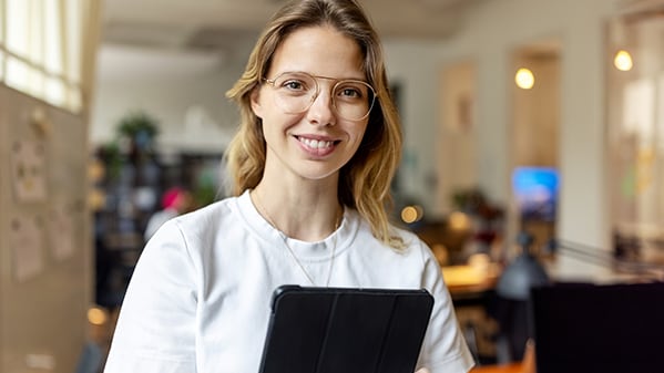 business professional holding tablet device