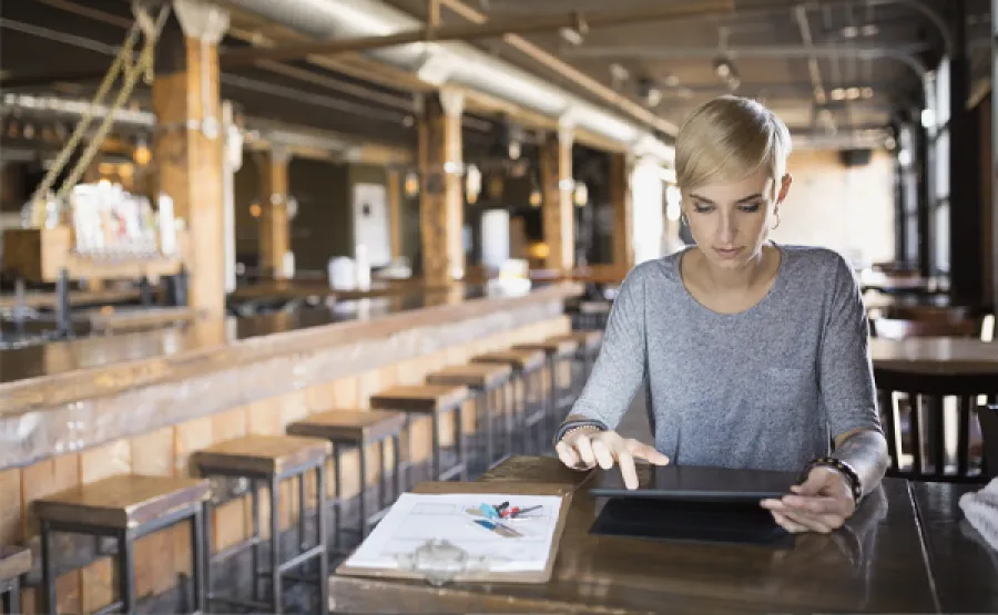 woman working on a tablet