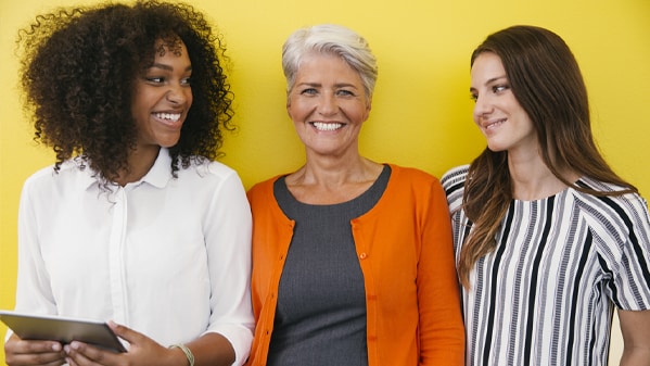 three women smiling