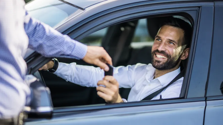 man in a car