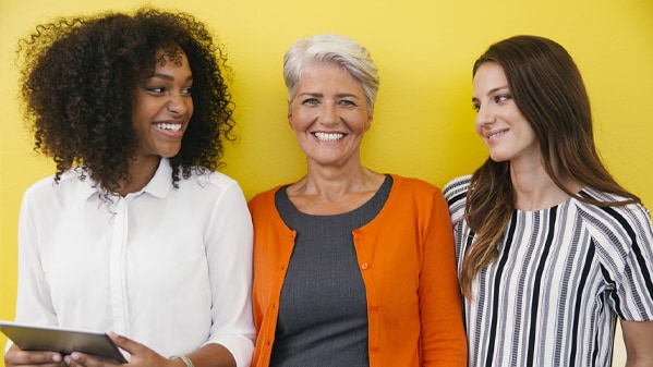 three women smiling