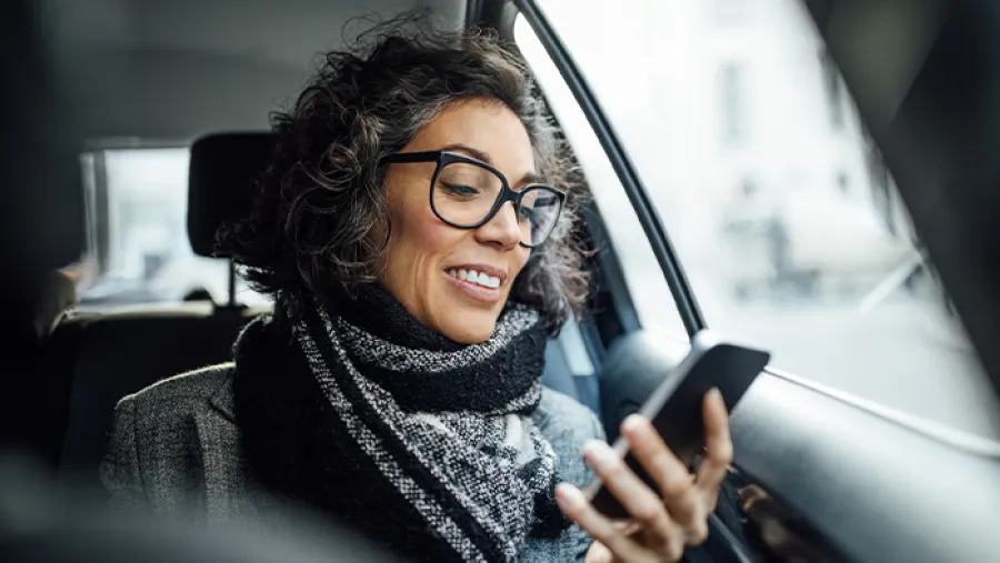 business traveler on mobile phone