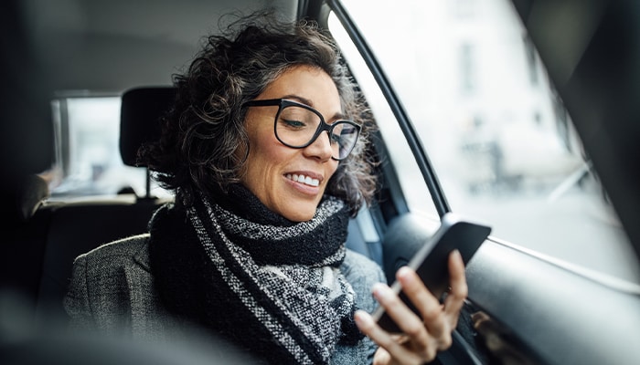 business traveler on mobile phone