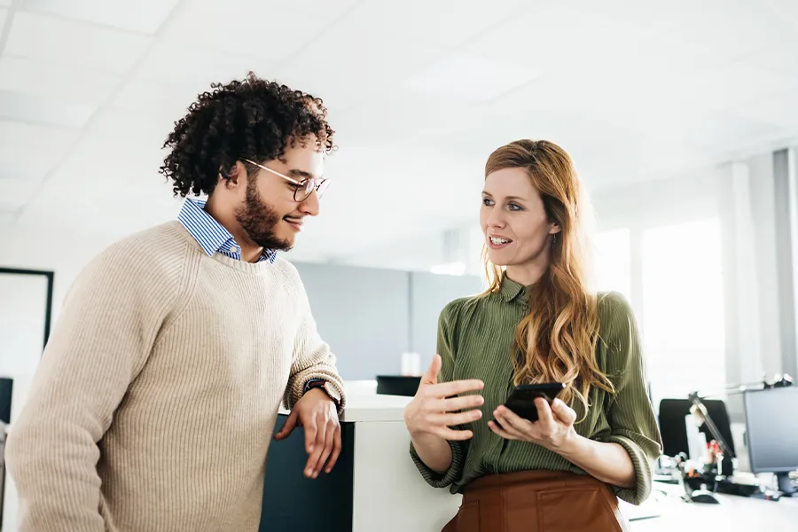 two business professionals speaking
