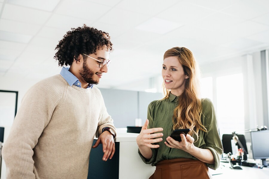 two business professionals speaking