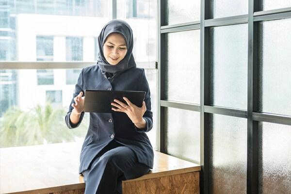 woman working on a tablet