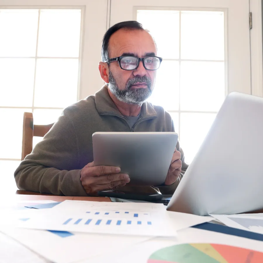 man looking at laptop