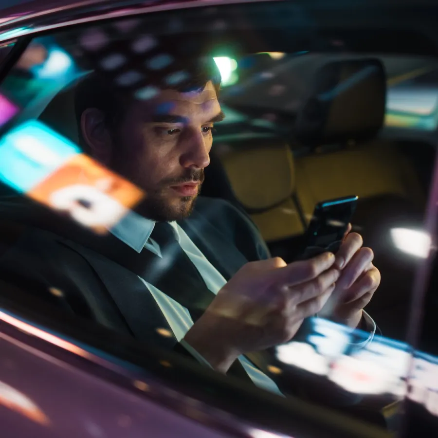 man on the phone in the car