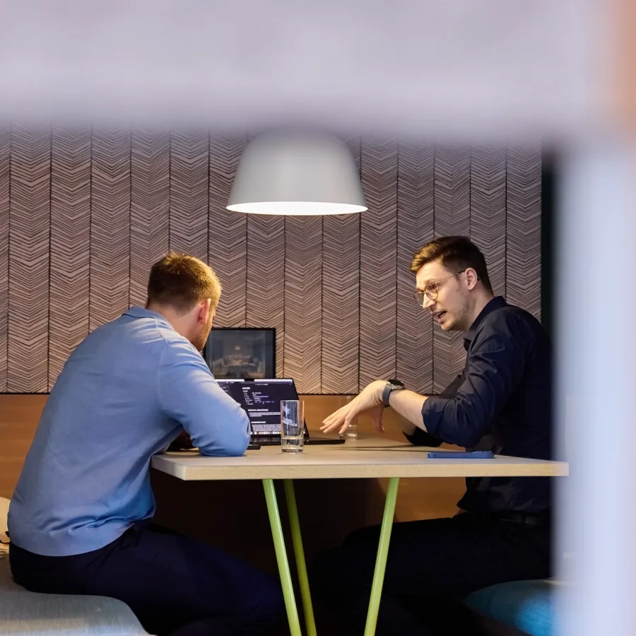 two people working together