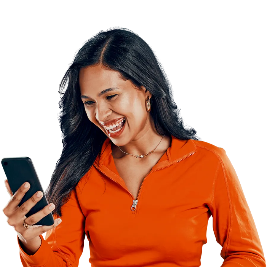 woman smiling at phone