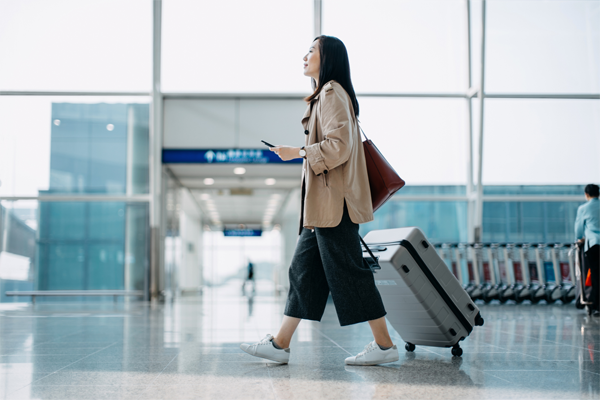 woman walking in airport