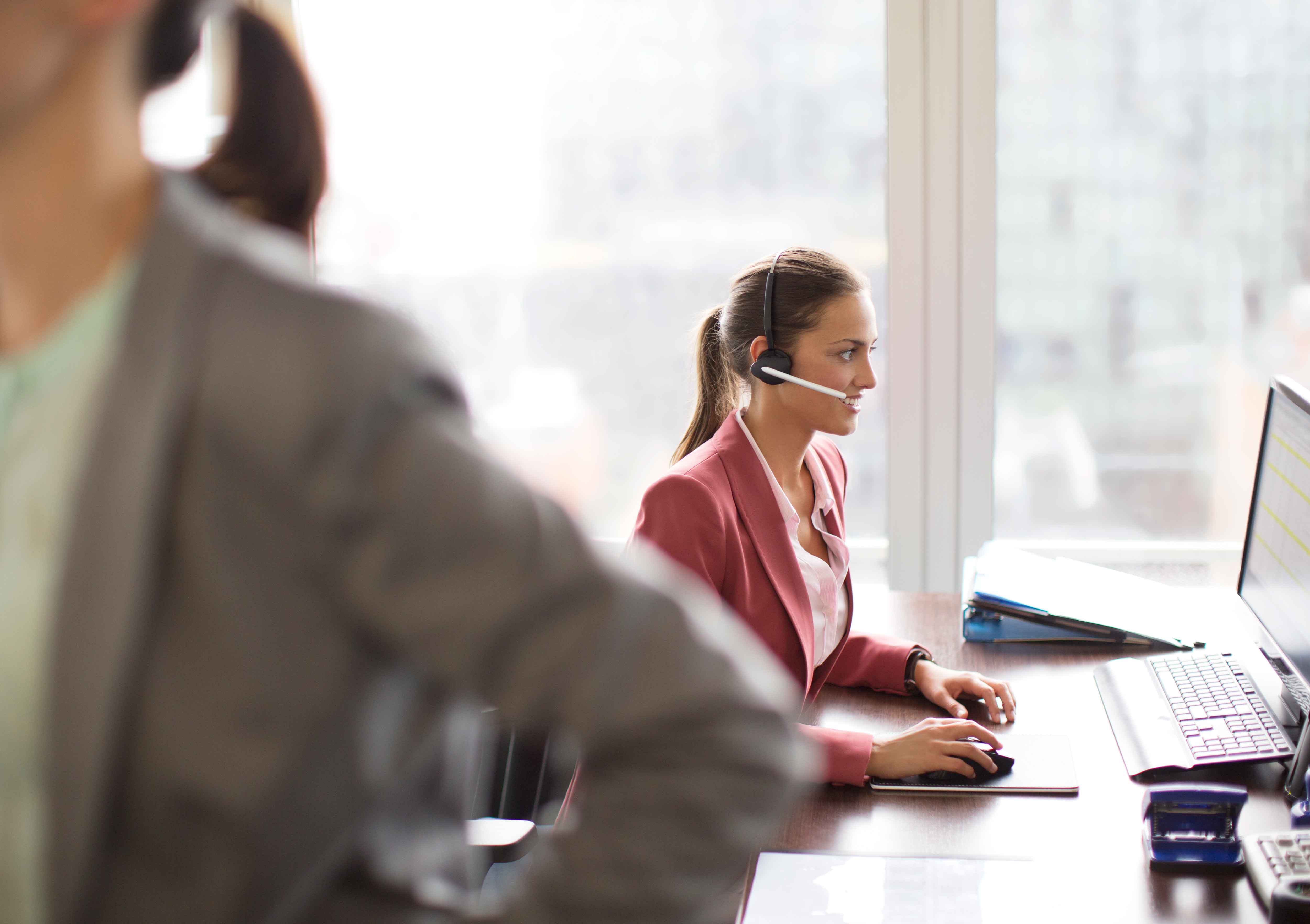 Woman wearing headset