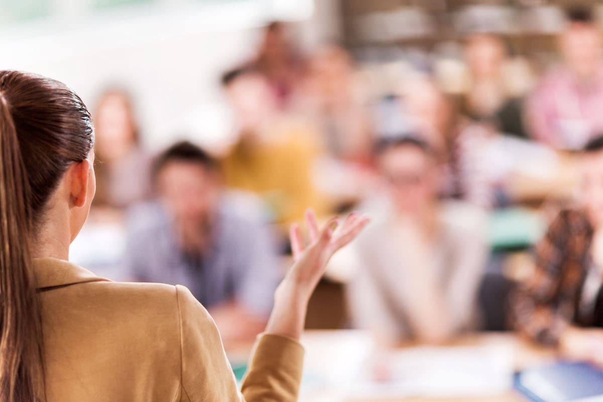 group of people with speaker