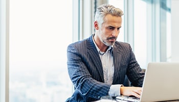 man working on laptop