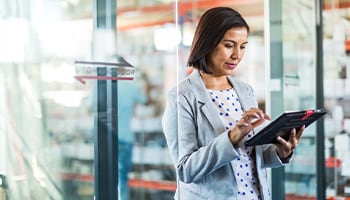 woman working on tablet